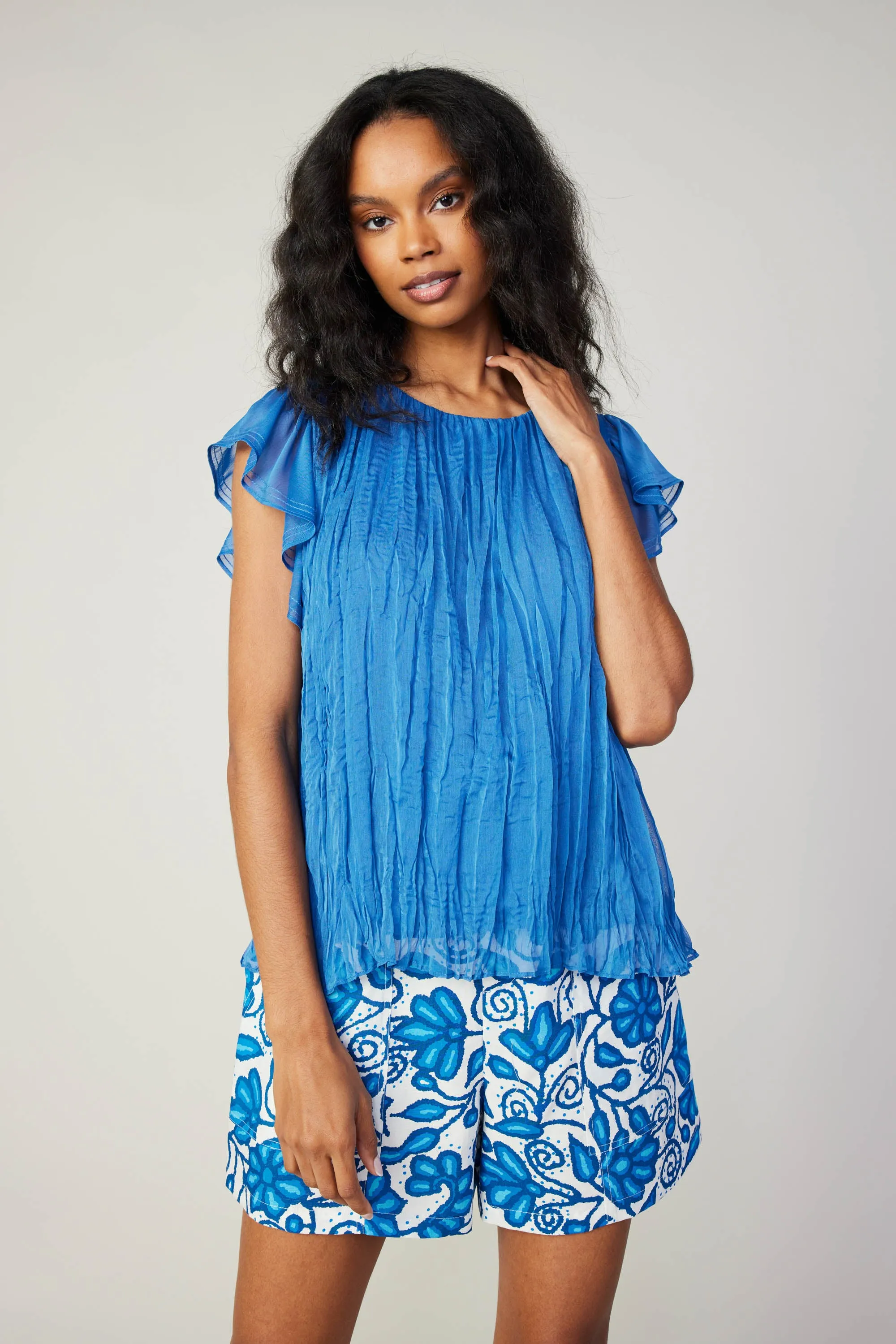 Crinkled Flutter Sleeve Top sold by Current Air