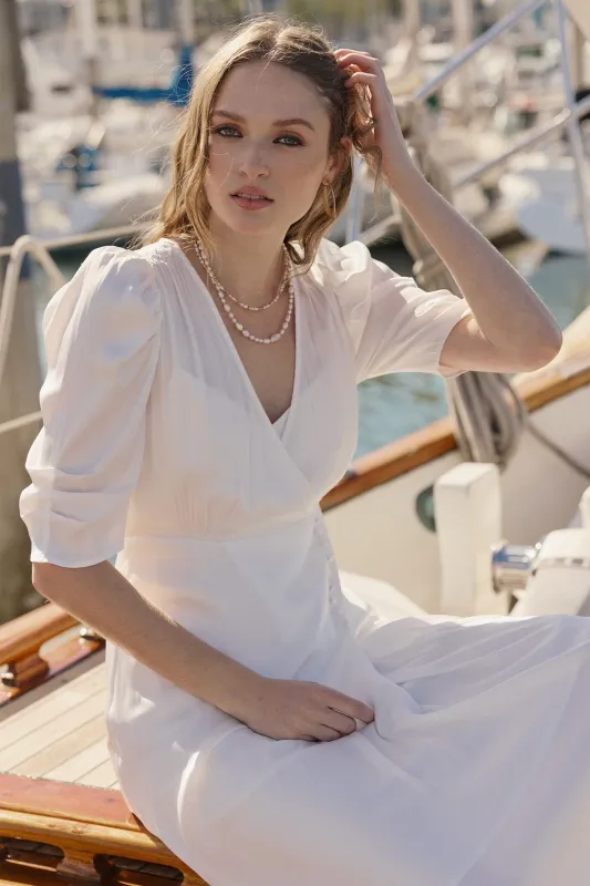 Surplus dress with ruched sleeve sold by Current Air