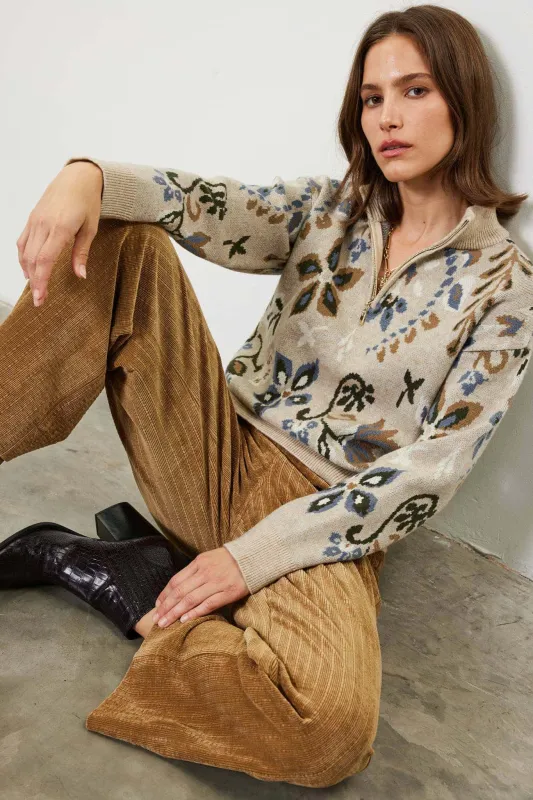 Half-zip closure with long sleeves sold by Current Air