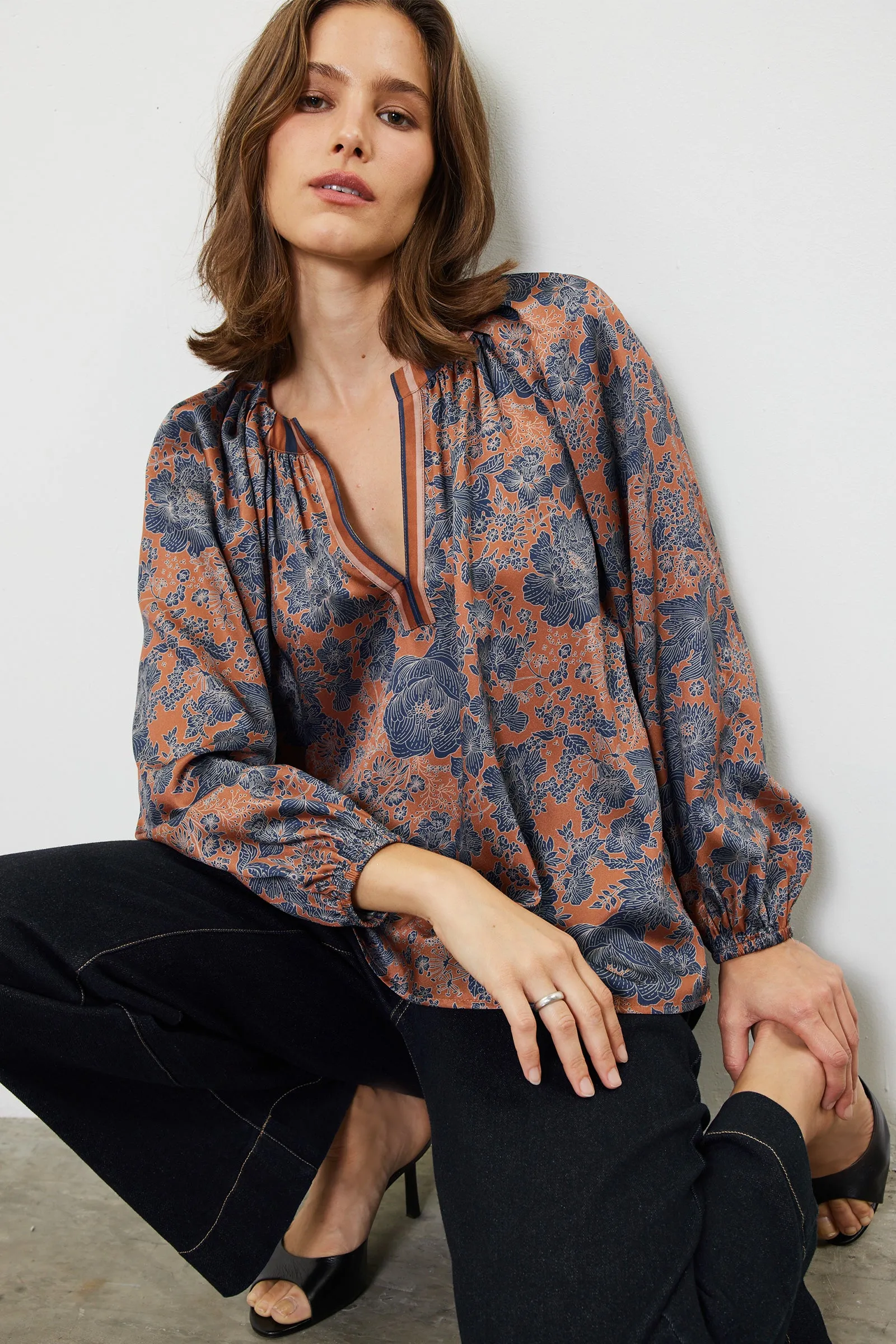 Elegant drape blouse sold by Current Air