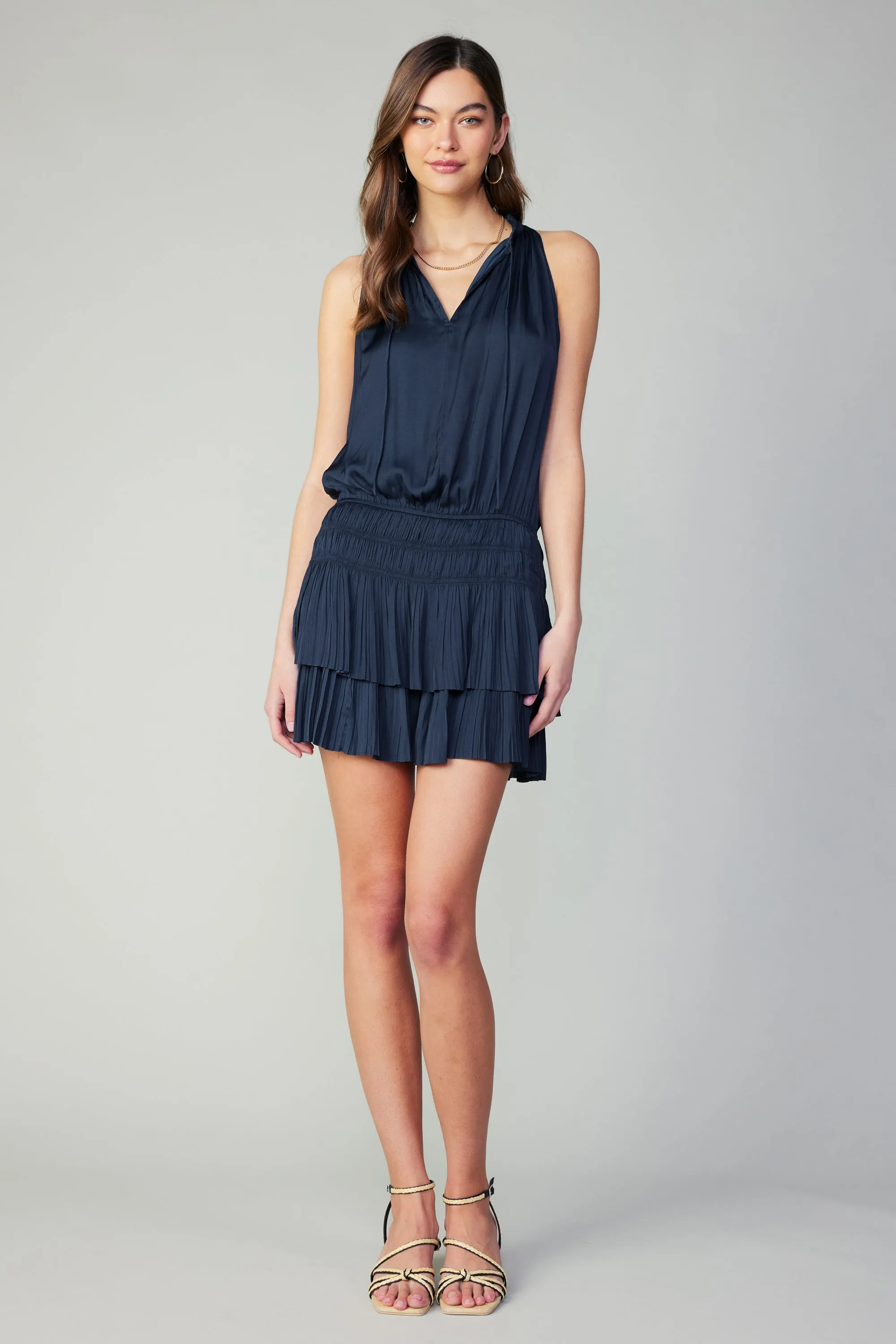 Cara Sleeveless Pleated Mini Dress sold by Current Air