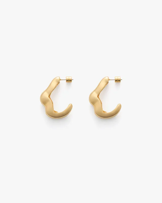 Ola Hoop Earrings sold by Cuyana