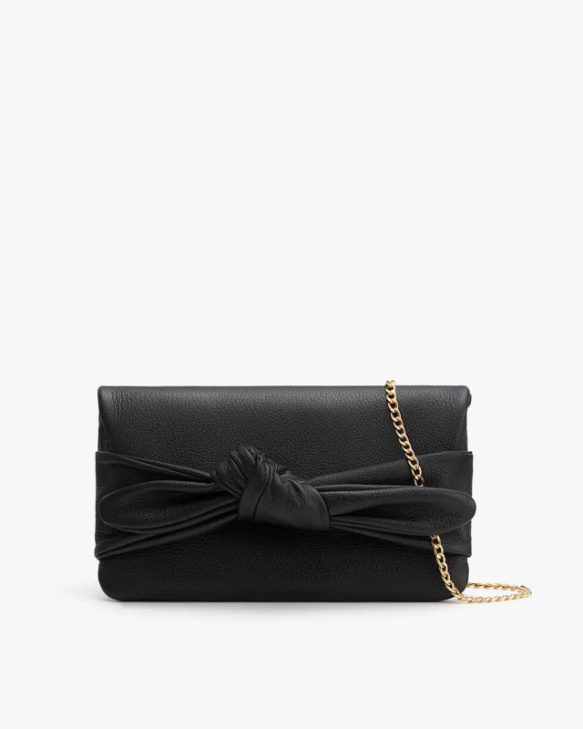 Bow Clutch sold by Cuyana
