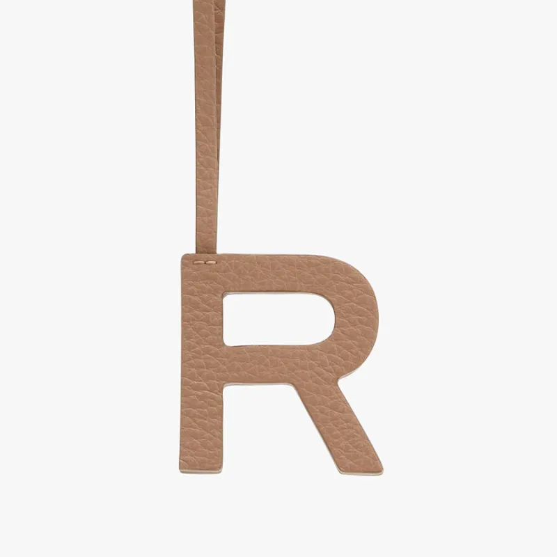 Letter Keychain R sold by Cuyana