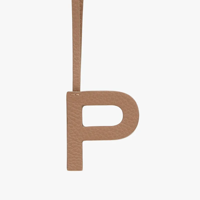 Letter Keychain P sold by Cuyana