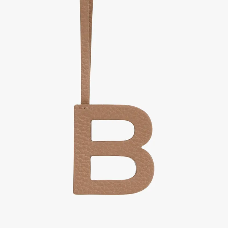 Letter Keychain B sold by Cuyana