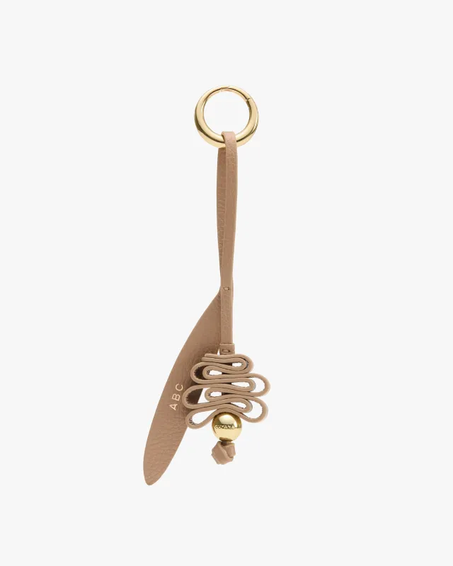 Serpentina Keychain made by Cuyana