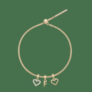 2 contour hearts & your choice of one letter on snake bracelet sold by Daniel Wellington