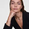 Blue Spot Heart Gold Charm sold by Daniel Wellington