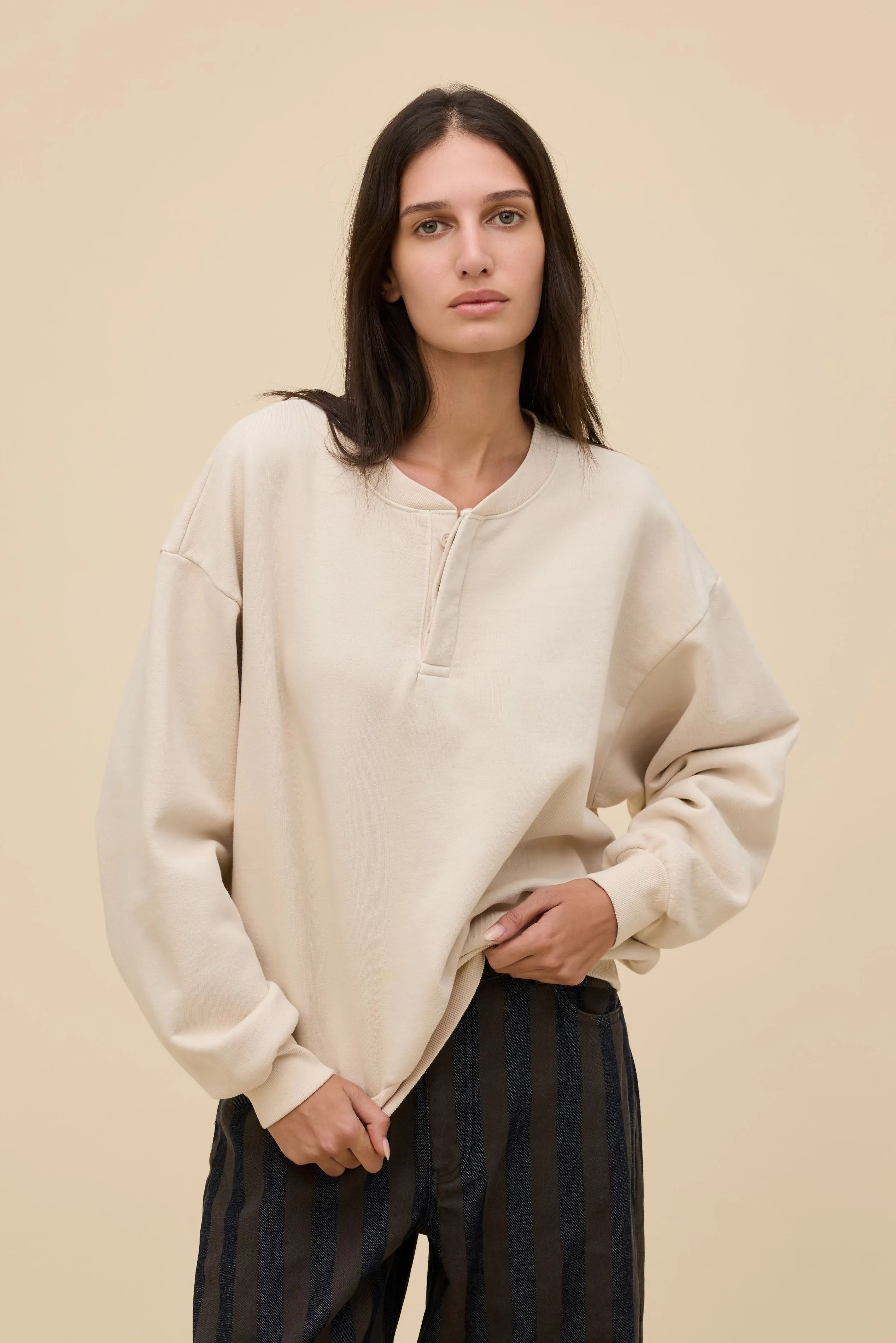 Solid Oversized Henley Sweatshirt sold by Daydreamer
