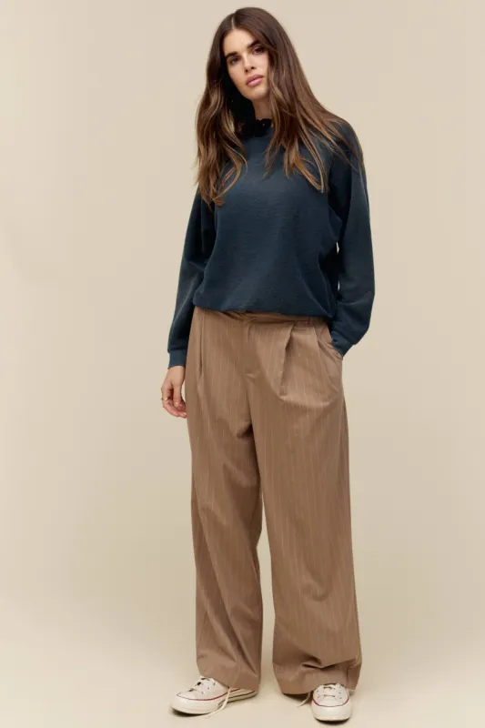 Solid Reverse Raglan Sweatshirt in Sun Faded Black sold by Daydreamer