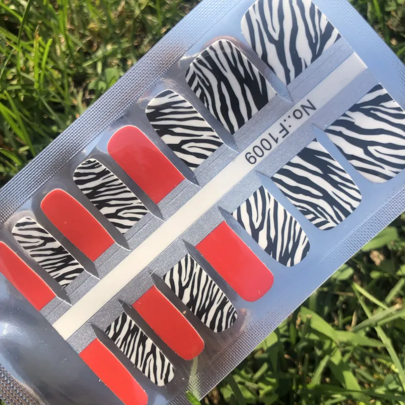 Red Zebra - Pedi sold by De's Nails