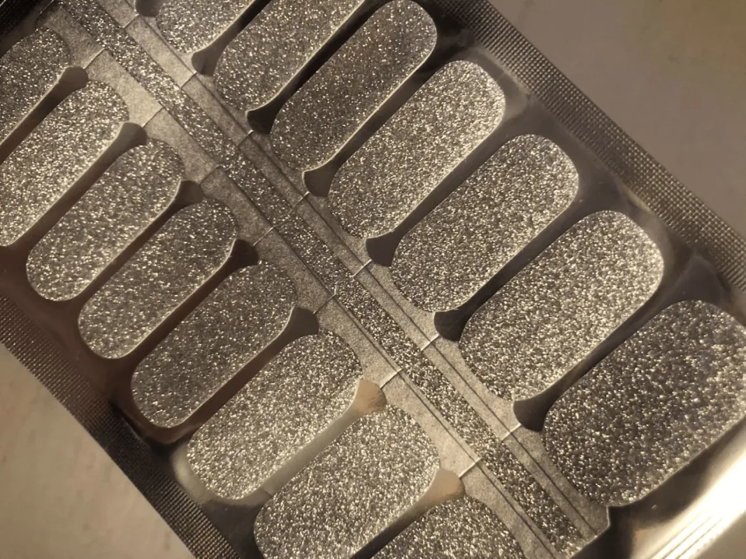Silver sparkle Nail Polish Wraps sold by De's Nails