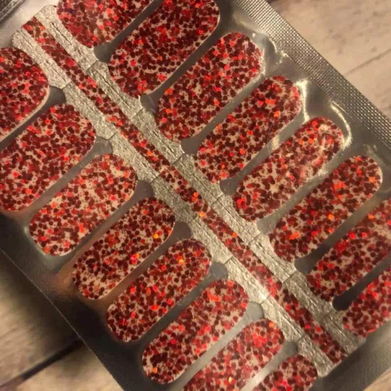 Red Glitter sold by De's Nails