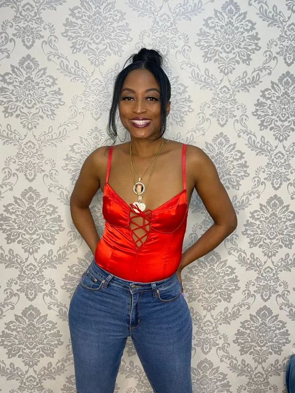"IT'S RED" BODYSUIT sold by 24/7 Denim
