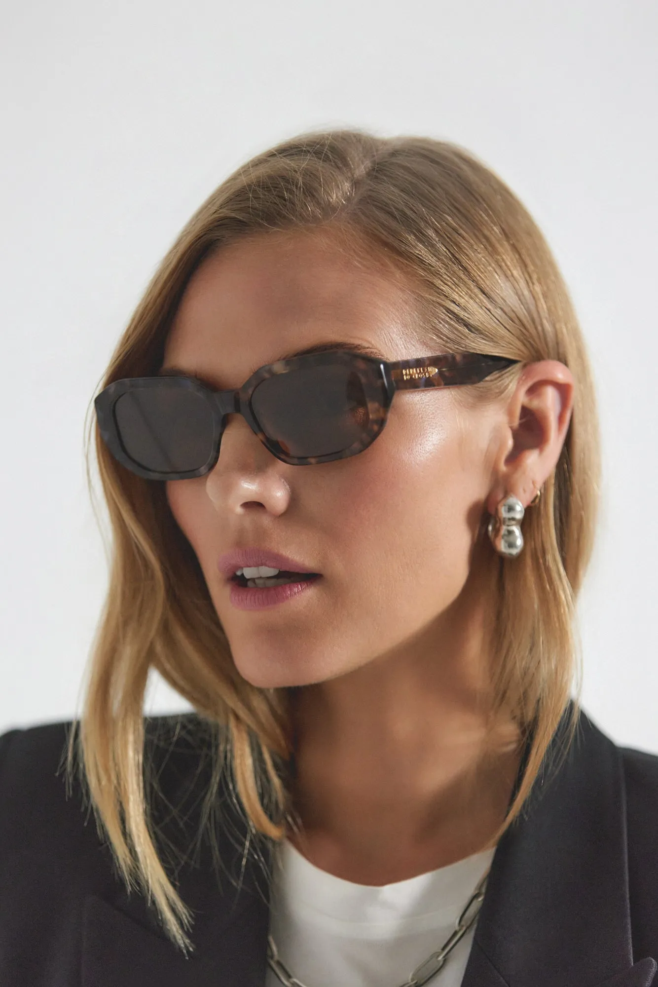 Fidela Angular Chunky Oval Sunglasses - Light Tortoise sold by Derek Lam