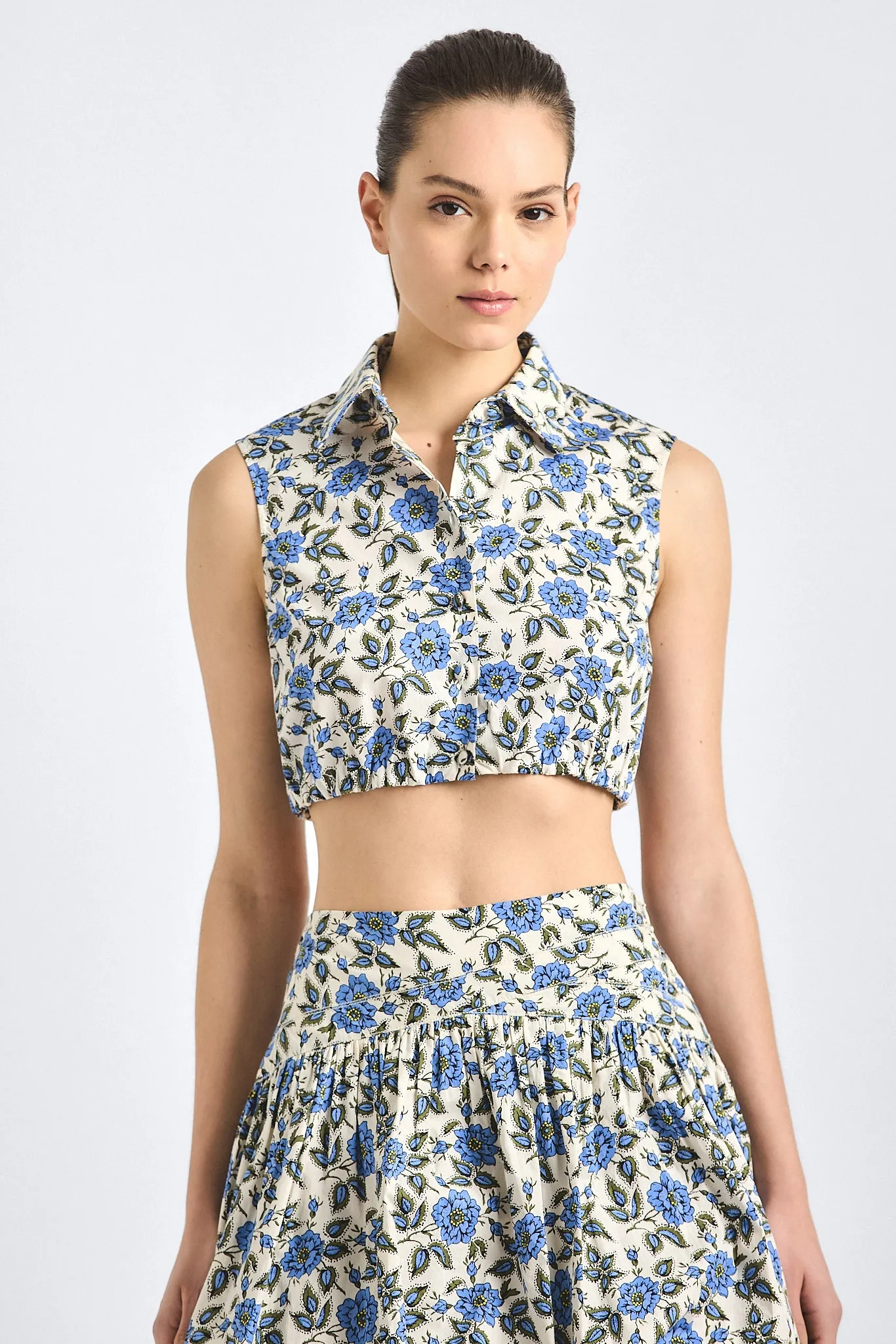 Faee Cropped Sleeveless Shirt - Blue Bell Floral sold by Derek Lam