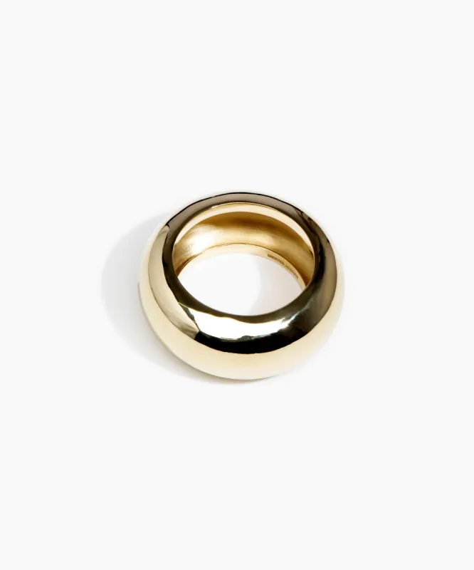 Wide Boulder Bangle sold by Dinosaur Designs