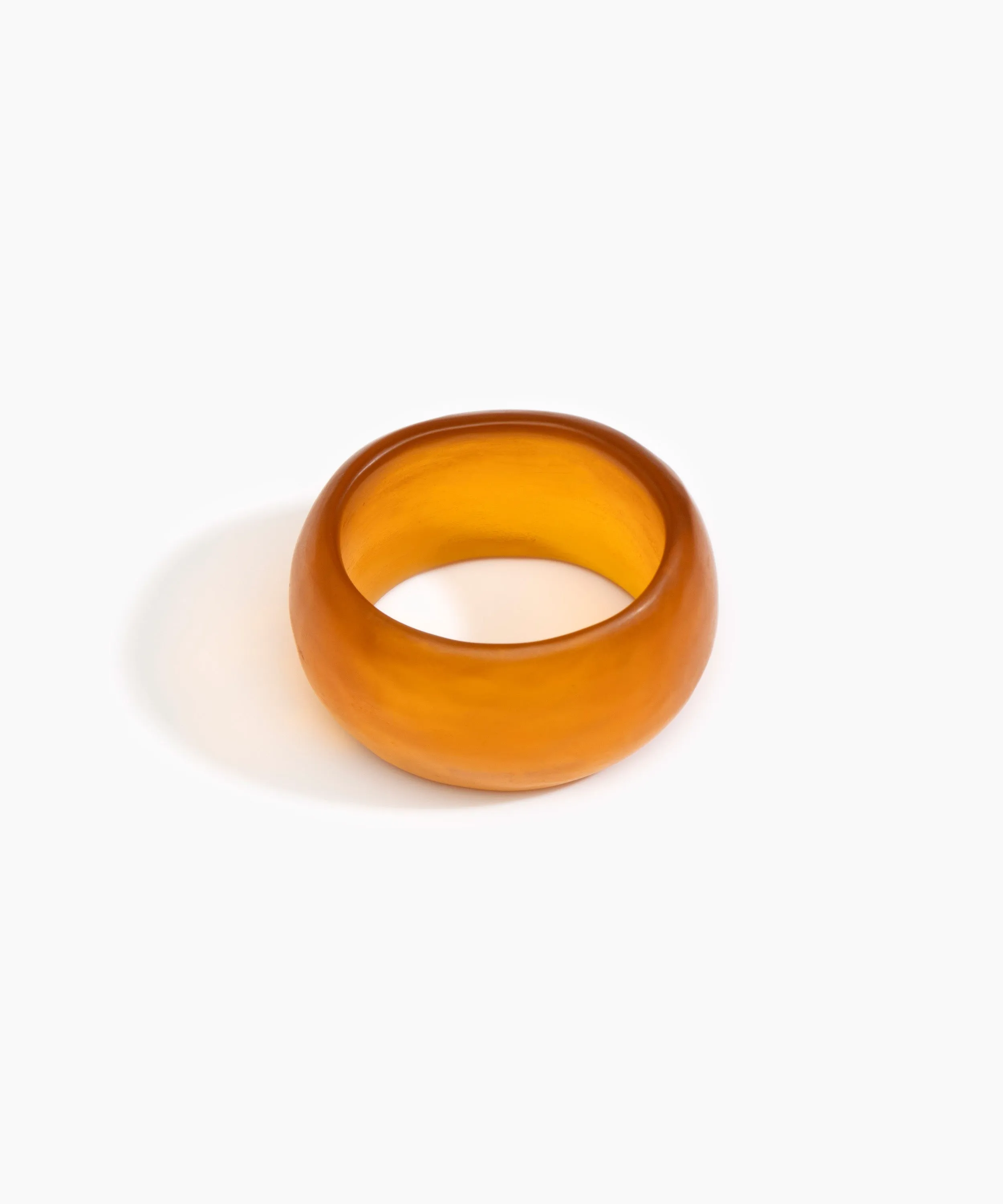 Large Organic Oval Bangle sold by Dinosaur Designs