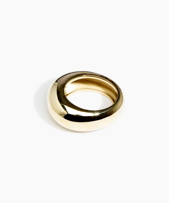 Wide Rock Bangle sold by Dinosaur Designs