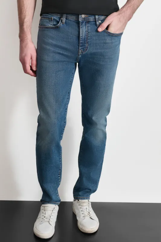 Slim Straight Mid Wash Denim sold by DKNY