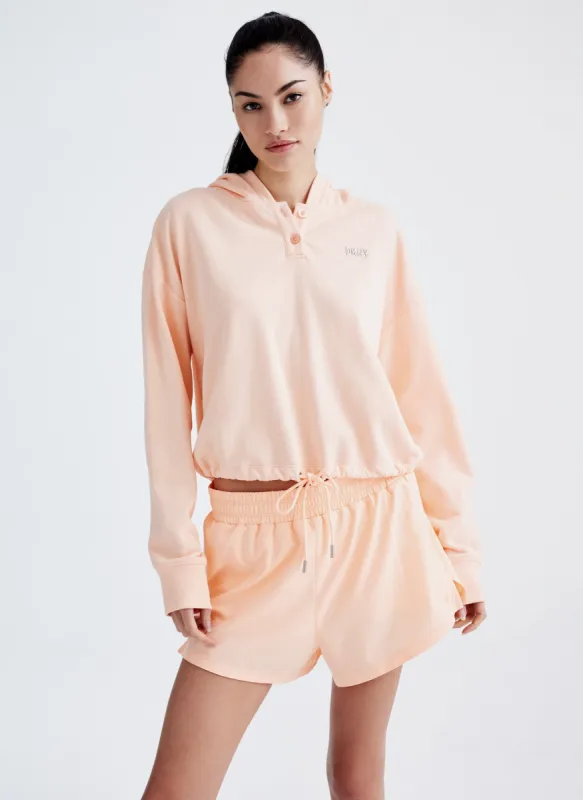 METALLIC BUBBLE LOGO CROPPED PULLOVER sold by DKNY