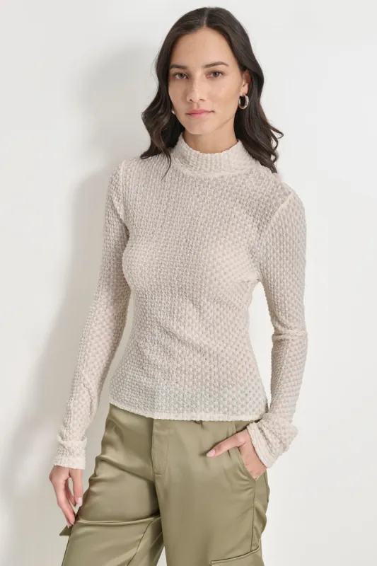 PEBBLE LACE TURTLENECK sold by DKNY