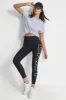 CROPPED MID-RISE LOGO COMPRESSION LEGGING sold by DKNY
