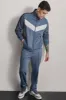 LOGO TRACK JACKET sold by DKNY