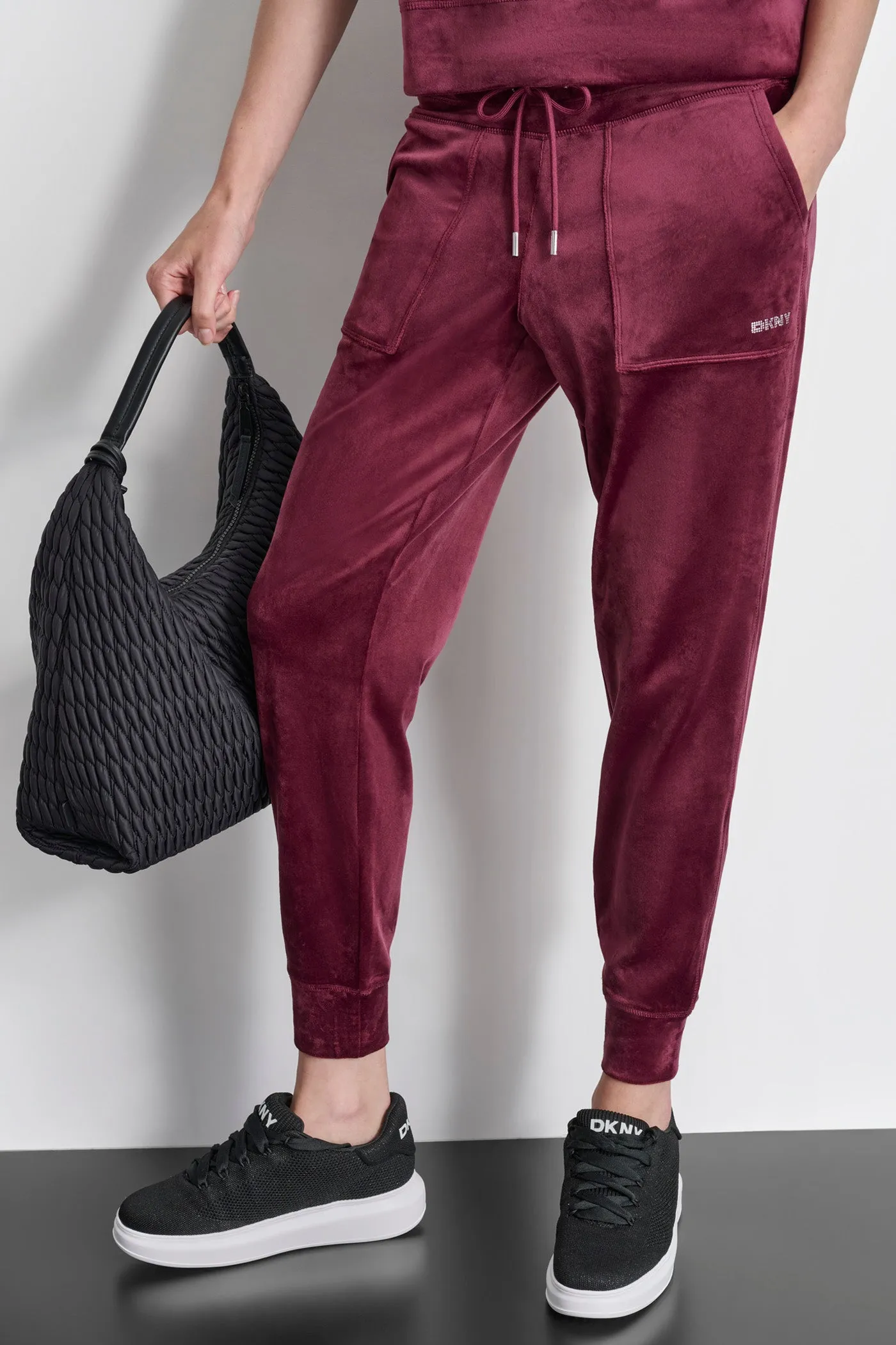 PLATINUM VELOUR RHINESTONE LOGO JOGGER sold by DKNY