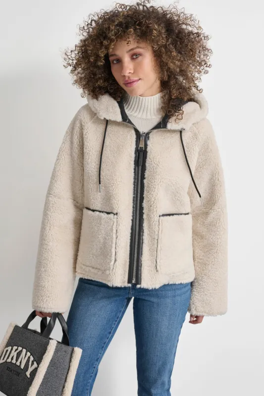 REVERSIBLE FAUX SHEARLING JACKET sold by DKNY
