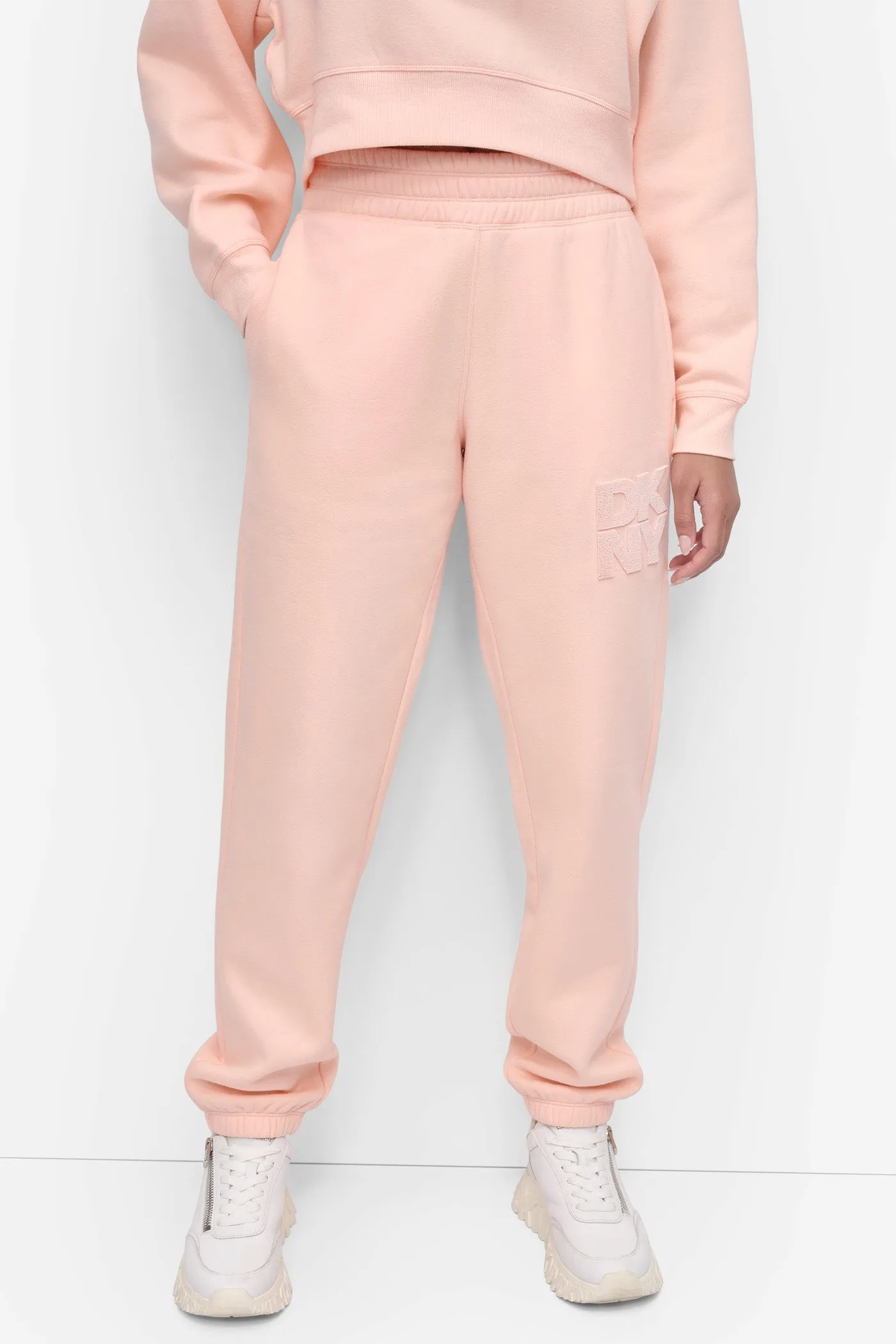 HIGH-RISE FLOCKED LOGO JOGGER sold by DKNY