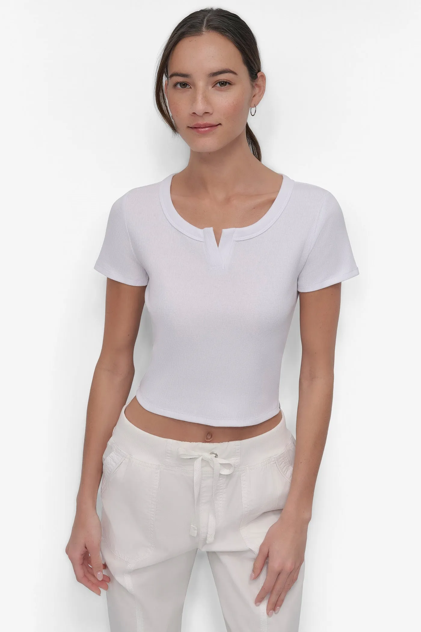 CROPPED NOTCH NECK PERFORMANCE TEE sold by DKNY