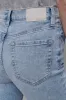 HIGH-RISE RAW EDGE FLARE JEAN sold by DKNY