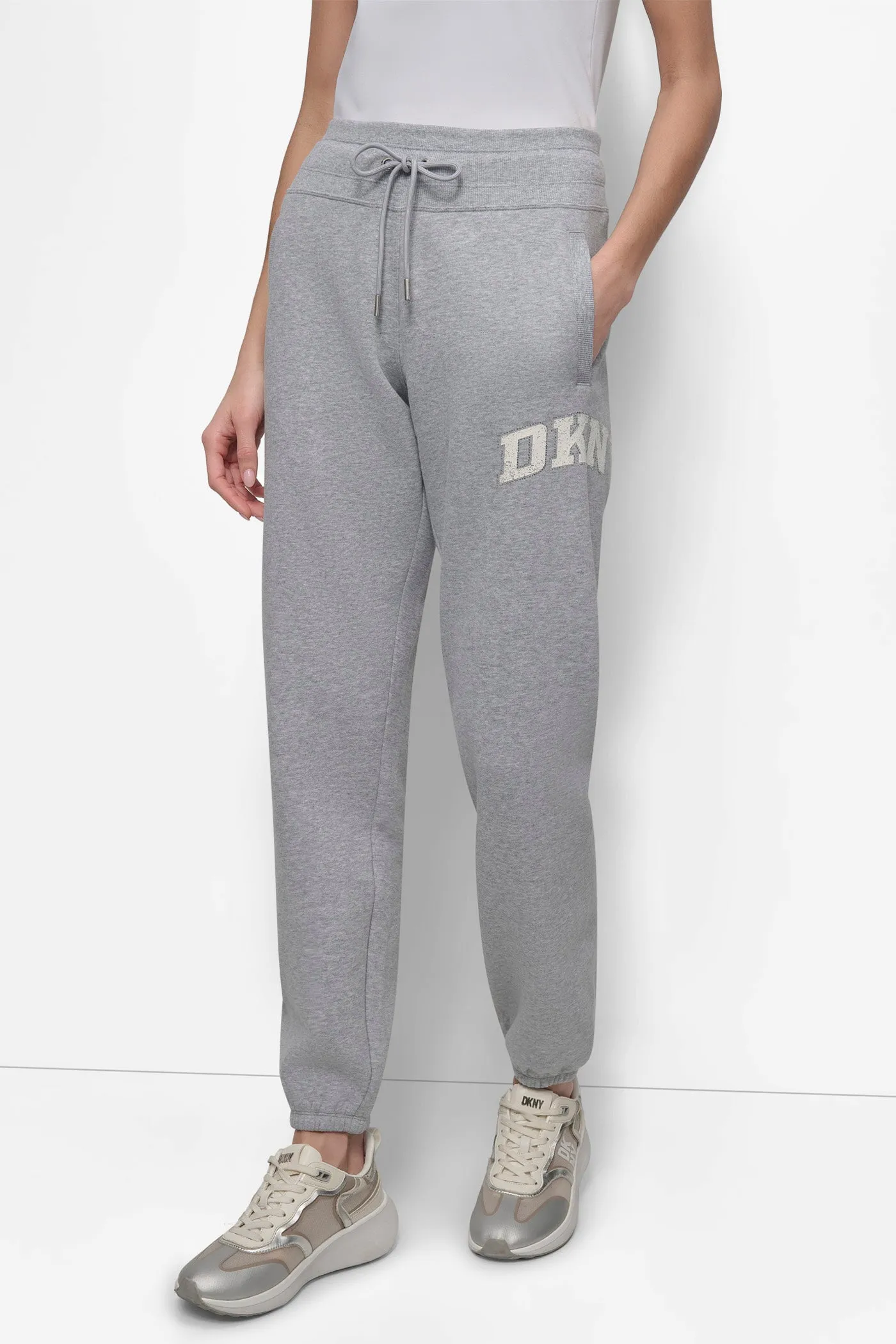 HIGH-RISE RHINESTONE TRIMMED LOGO JOGGER sold by DKNY