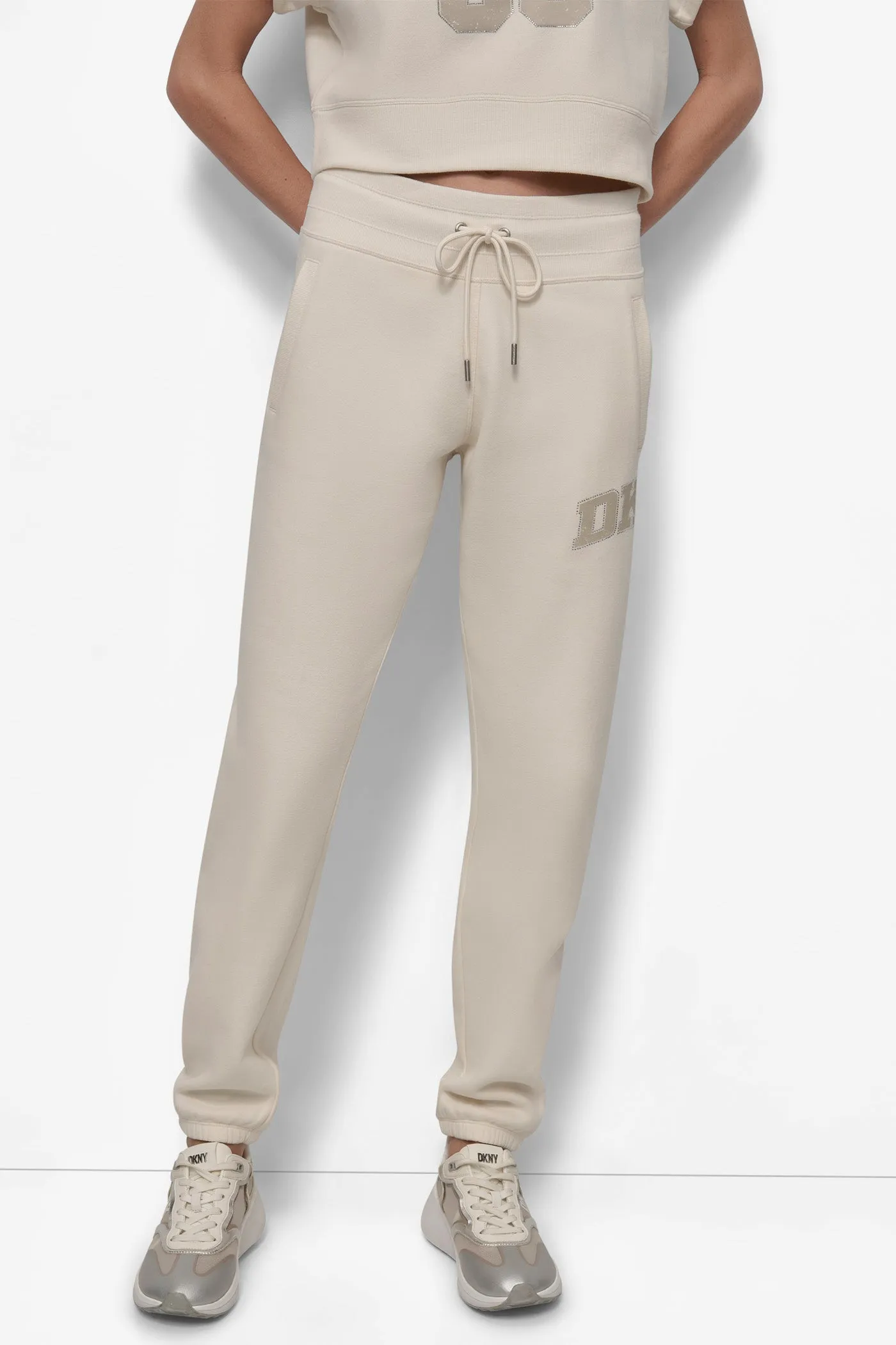 ARCHED DKNY 89 DISTRESSED RHINESTONE LOGO RELAXED sold by DKNY