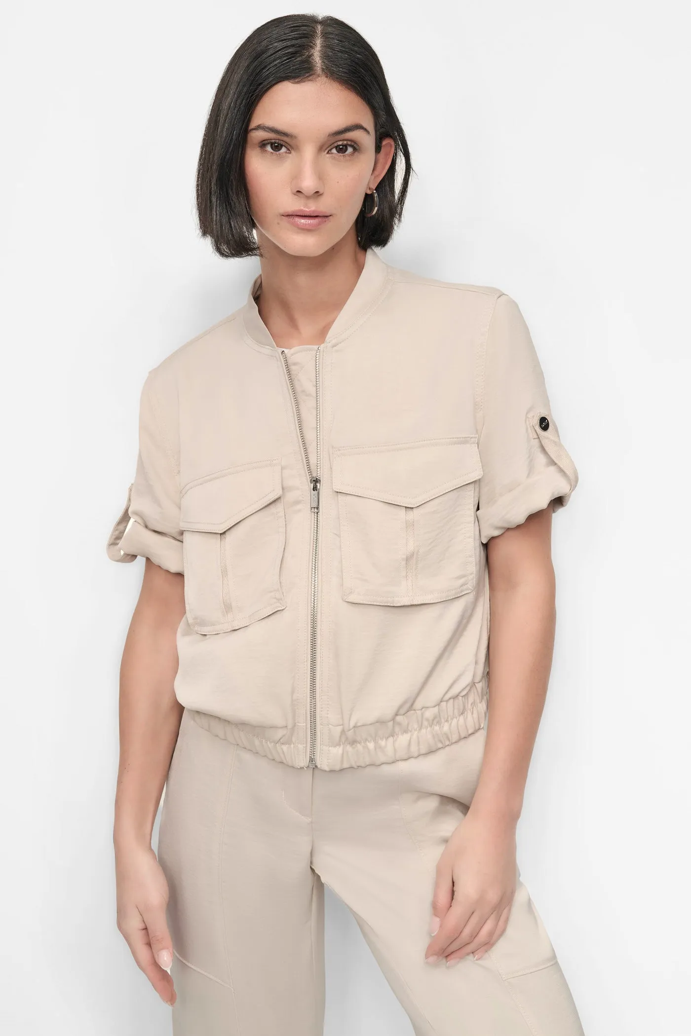 SHORT SLEEVE ROLL TAB ZIP FRONT sold by DKNY