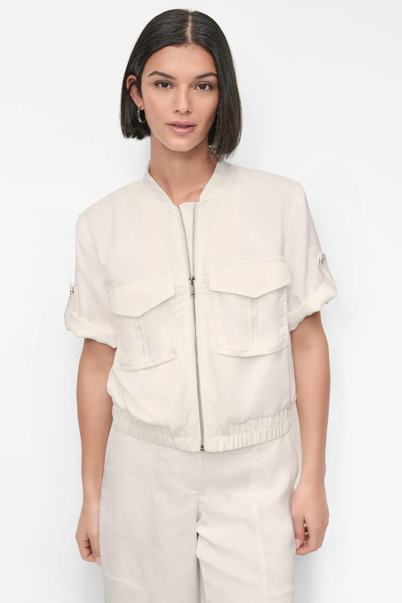 SHORT SLEEVE ROLL TAB ZIP FRONT sold by DKNY