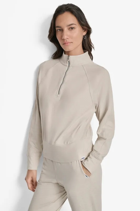 HALF-ZIP SWEATER sold by DKNY