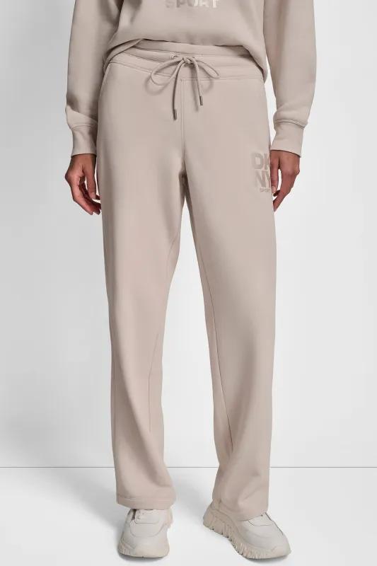 HIGH-RISE LOGO SLIM TRACK PANT sold by DKNY
