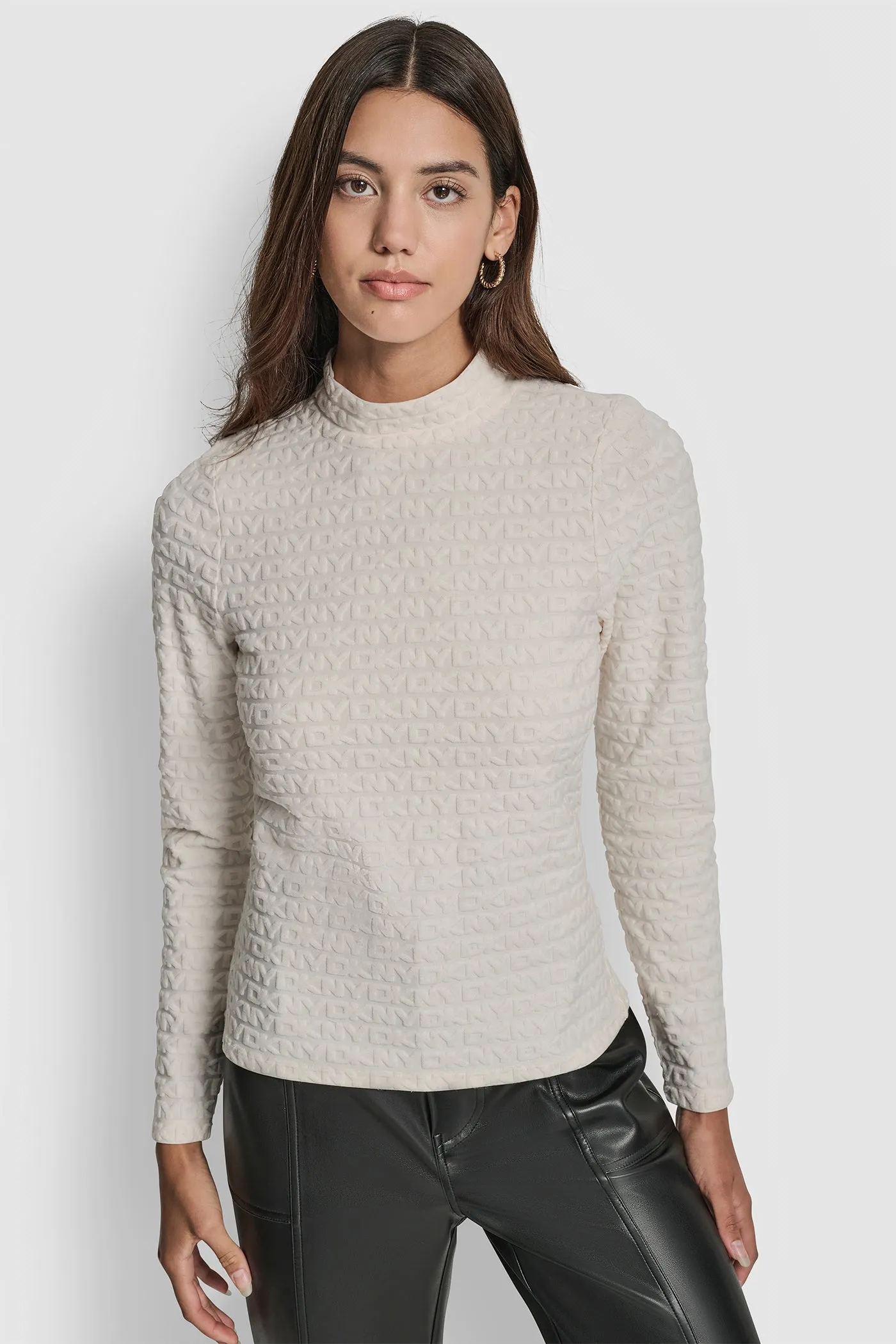 LOGO JACQUARD LONG SLEEVE MOCK NECK TEE sold by DKNY