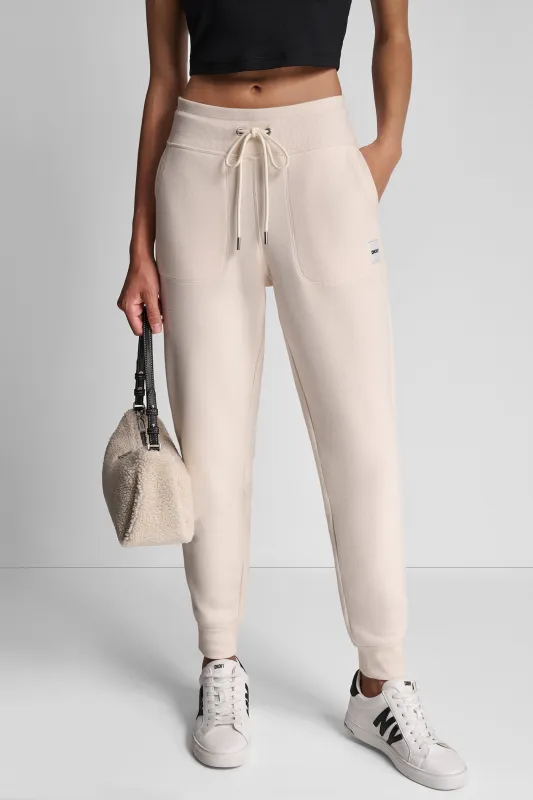 HIGH-RISE LOGO-EMBELLISHED JOGGER sold by DKNY