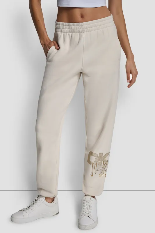 GRAFFITI RHINESTONE LOGO HIGH RISE RELAXED FIT JOGGER sold by DKNY