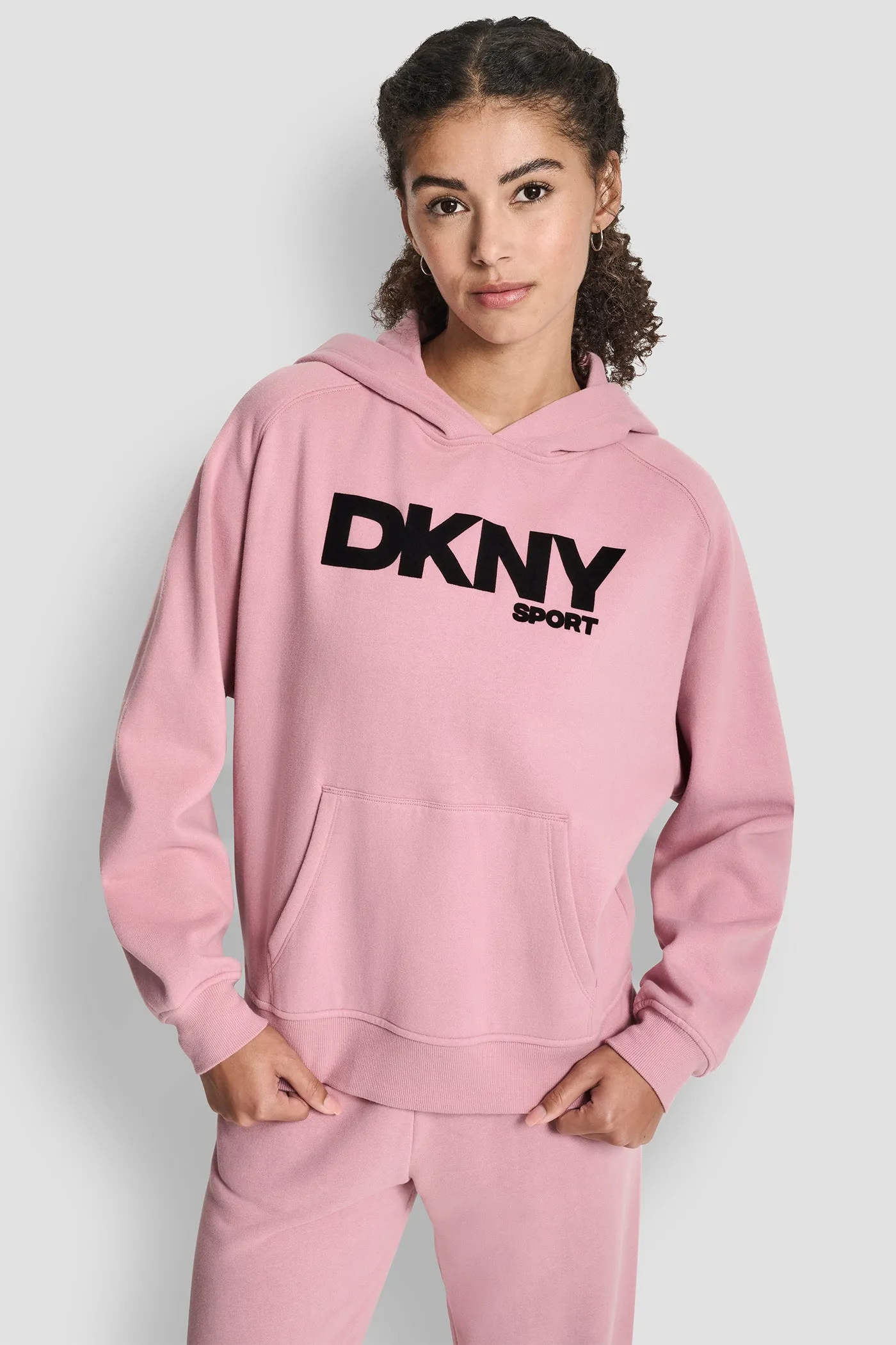 OVERSIZED FLOCKED LOGO PULLOVER HOODIE sold by DKNY