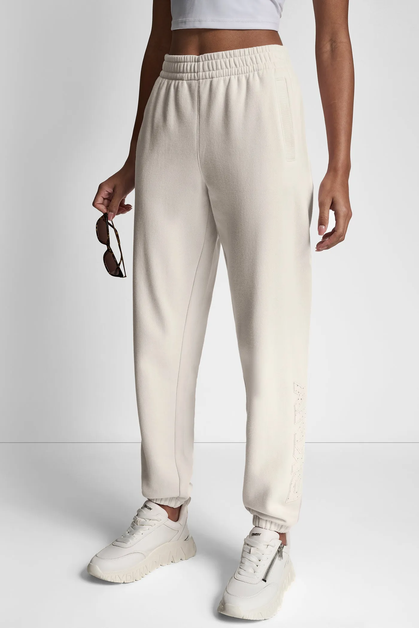 RAISED EMBROIDERY OUTLINE RHINESTONE LOGO JOGGER sold by DKNY