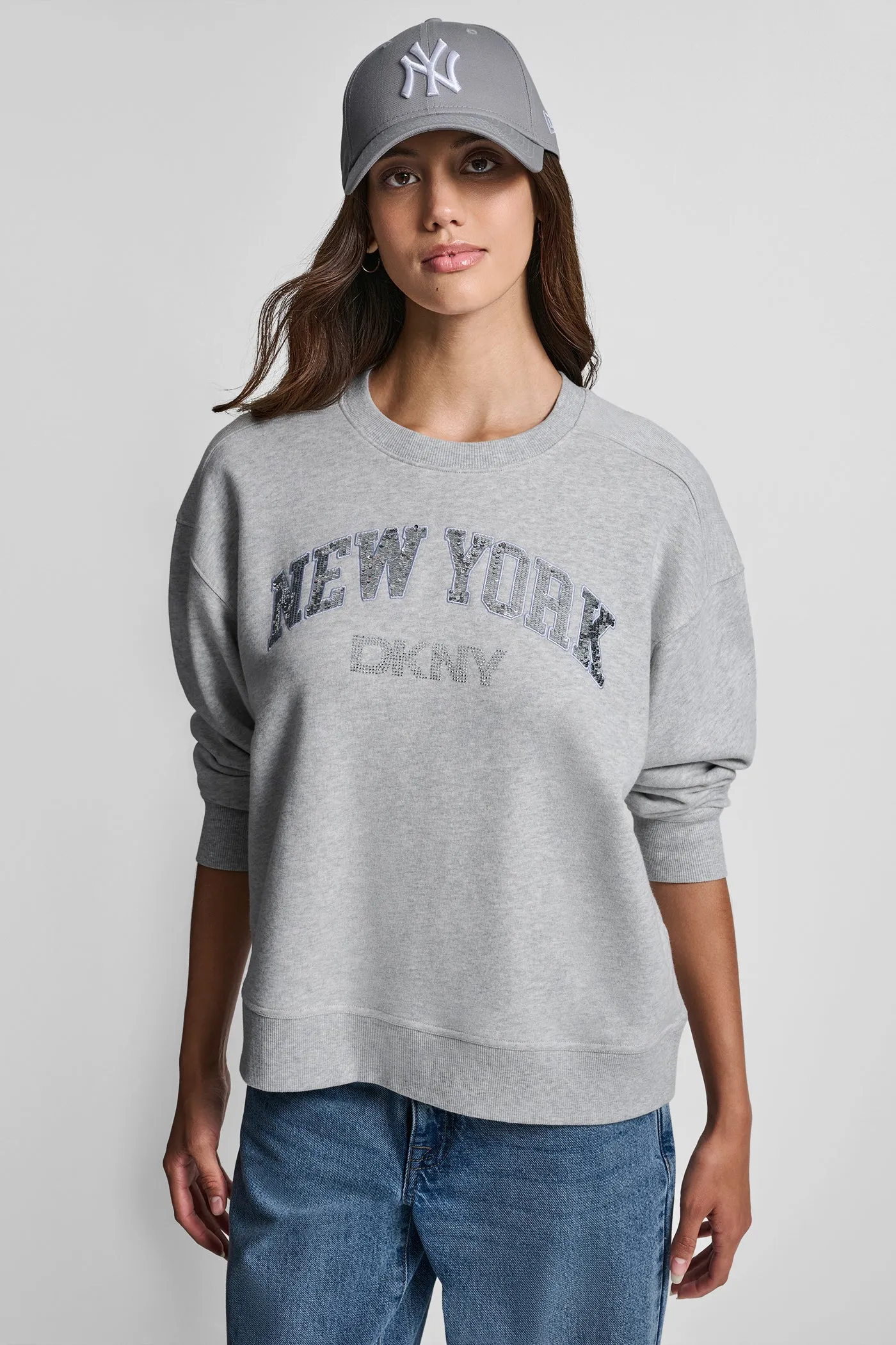 RHINESTONE STUD LOGO CREW NECK SWEATSHIRT sold by DKNY