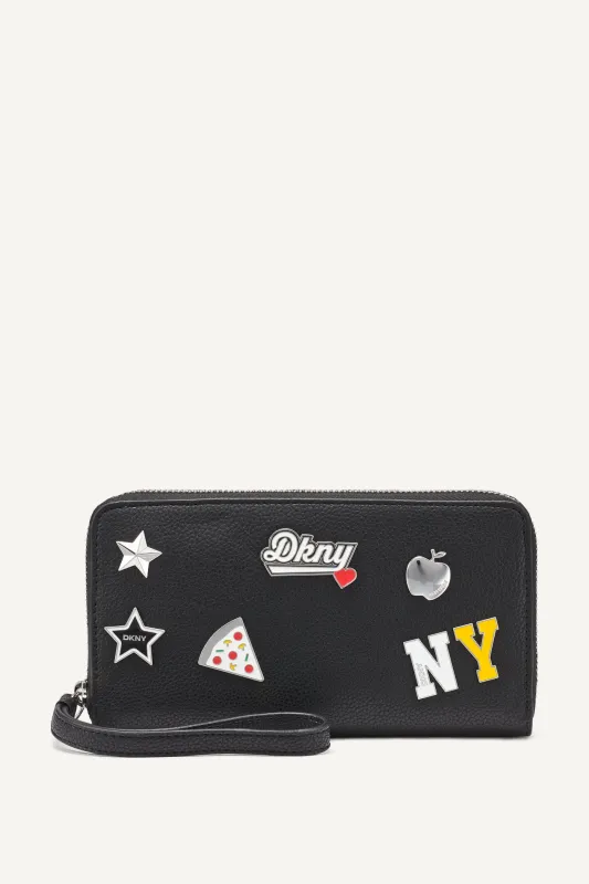 ETTA LARGE ZIP AROUND WALLET sold by DKNY