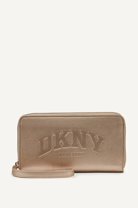 HADLEE LARGE ZIP AROUND WALLET sold by DKNY