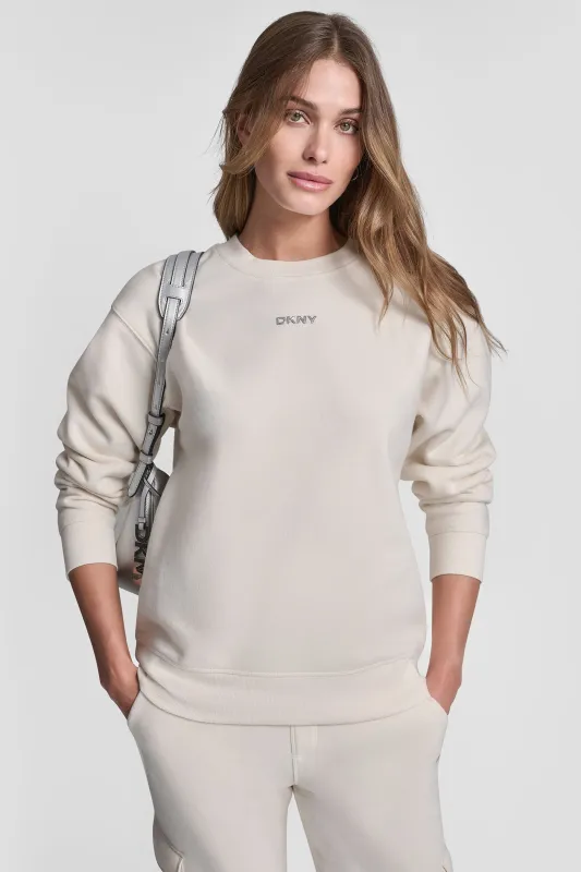 METALLIC BUBBLE LOGO FLEECE PULLOVER sold by DKNY