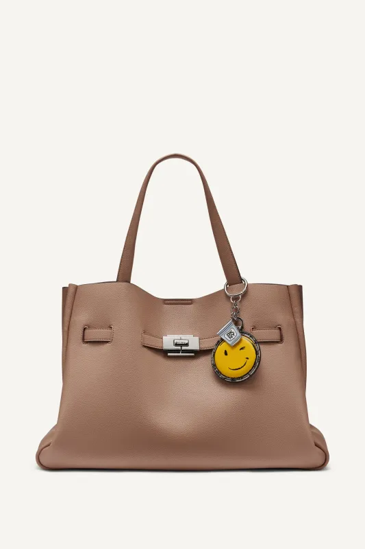 BRYAR LARGE SMILEY FACE SATCHEL sold by DKNY